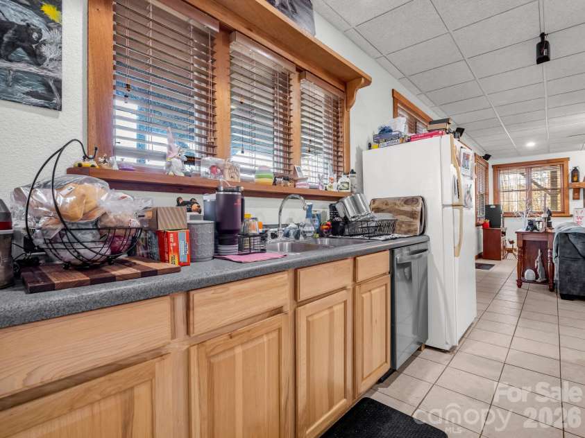 261 Boland Drive, Lake Lure, NC 28746.  MLS# CAR4232429, YatesRealty ID 3592. Finished Basement Kitchen