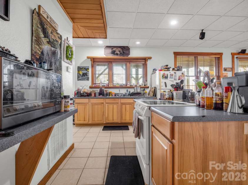 261 Boland Drive, Lake Lure, NC 28746.  MLS# CAR4232429, YatesRealty ID 3592. Finished Basement Open Concept 