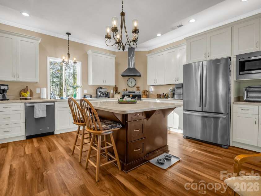 261 Boland Drive, Lake Lure, NC 28746.  MLS# CAR4232429, YatesRealty ID 3592. Kitchen view from Dining and Living Room