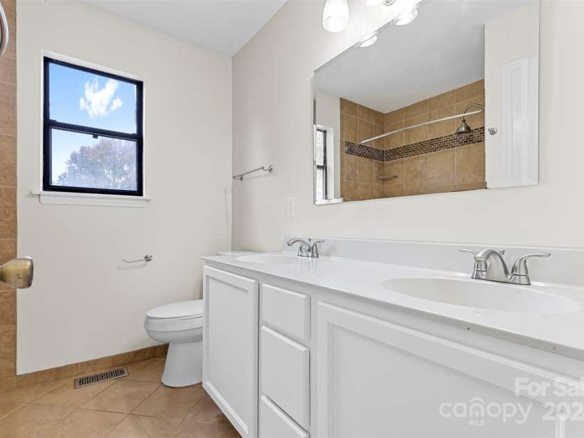 6400 Whitewater Drive, Charlotte, NC 28214.  MLS# CAR4197912, YatesRealty ID 3592. Hall Bathroom