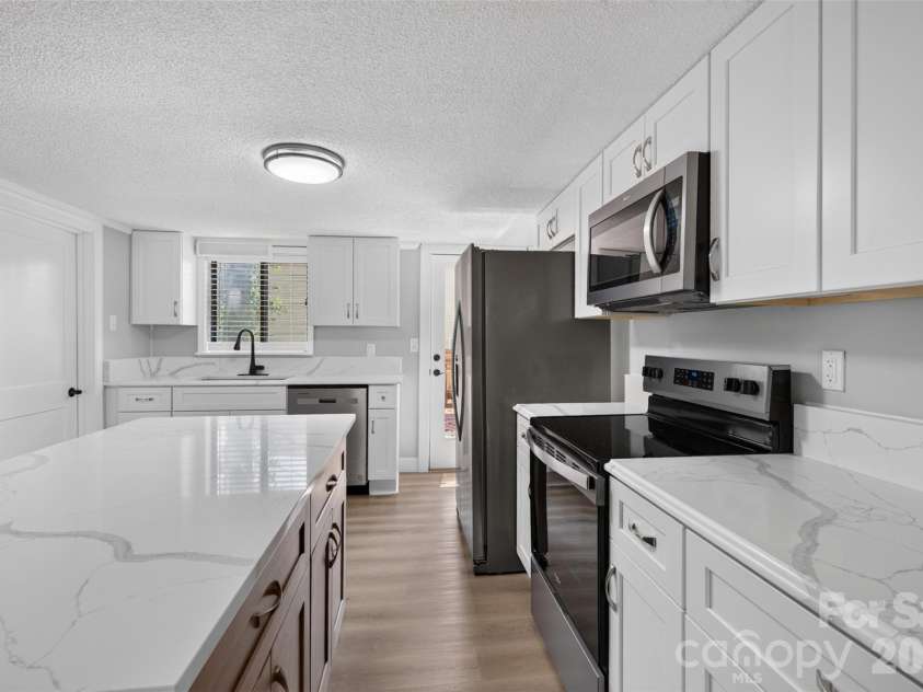 7040 Pear Tree Road, Charlotte, NC 28216.  MLS# CAR4402192, YatesRealty ID 35927. 