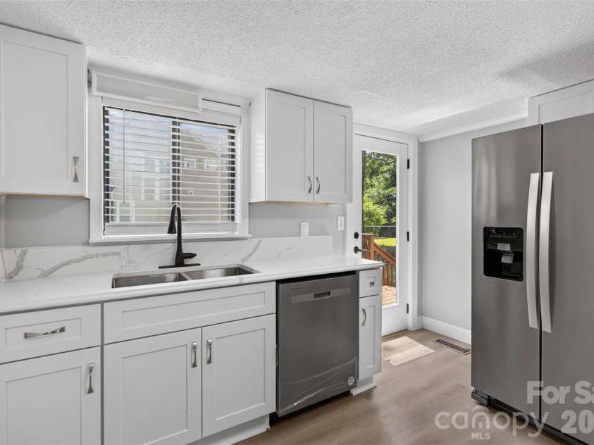 7040 Pear Tree Road, Charlotte, NC 28216.  MLS# CAR4402192, YatesRealty ID 35927. 