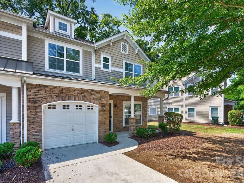 4711 Craigmoss Lane, Charlotte, NC 28278.  MLS# CAR4400112, YatesRealty ID 35930. Garage front