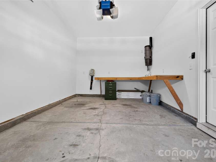 4711 Craigmoss Lane, Charlotte, NC 28278.  MLS# CAR4400112, YatesRealty ID 35930. Garage Interior