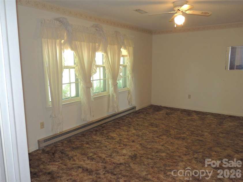 632 Rock Corner Road, Forest City, NC 28043.  MLS# CAR4402184, YatesRealty ID 35941. Living/Dining Room
