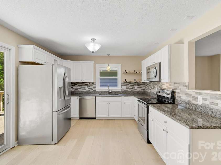 147 Birch Lane, Arden, NC 28704.  MLS# CAR4399222, YatesRealty ID 35947. 