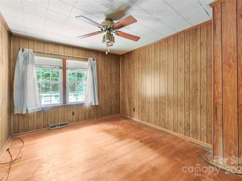 419 Monte Vista Road, Candler, NC 28715.  MLS# CAR4167954, YatesRealty ID 3595. Bedroom with ceiling fan