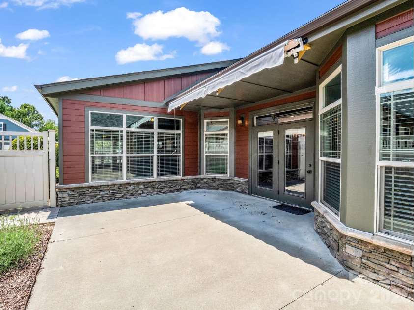 595 Summerfield Place, Flat Rock, NC 28731.  MLS# CAR4402478, YatesRealty ID 35964. Lovely patio