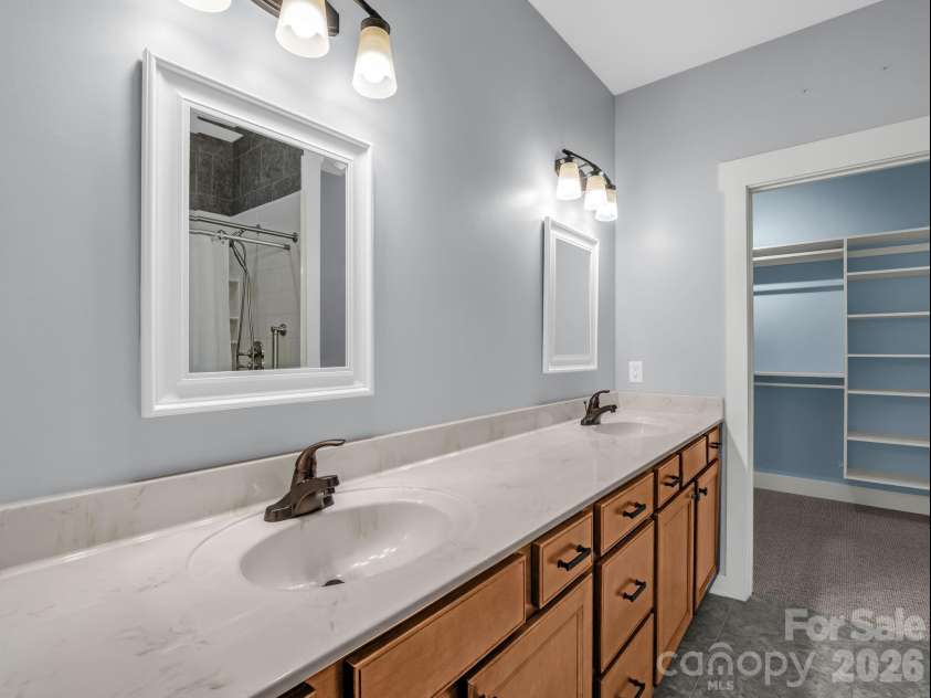 595 Summerfield Place, Flat Rock, NC 28731.  MLS# CAR4402478, YatesRealty ID 35964. Primary bath