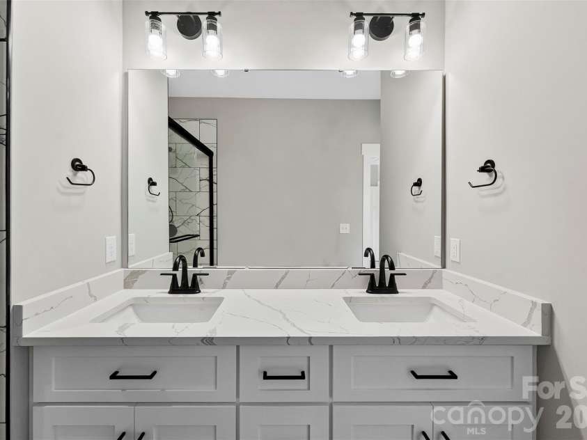 1024 Speight Road, Albemarle, NC 28001.  MLS# CAR4402924, YatesRealty ID 35969. Double Sink Quartz Top Vanity