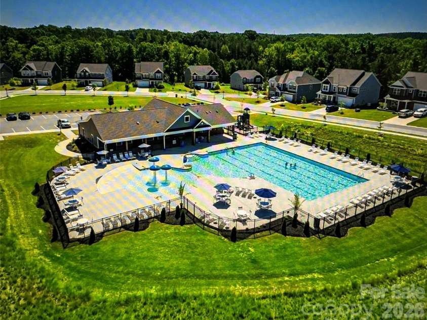 199 Hamptons Cove Road, Troutman, NC 28166.  MLS# CAR4398943, YatesRealty ID 35974. Community pool and splash pad