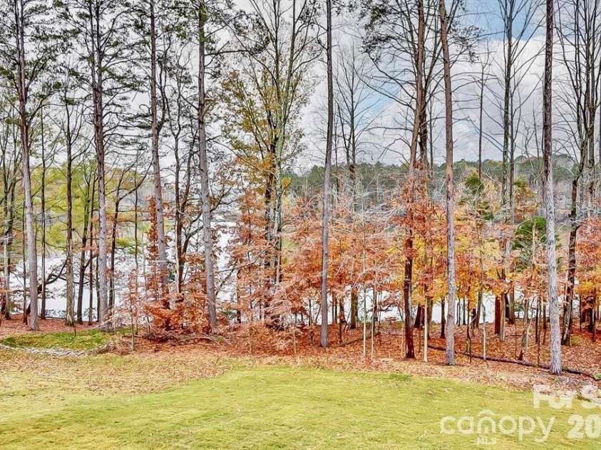 199 Hamptons Cove Road, Troutman, NC 28166.  MLS# CAR4398943, YatesRealty ID 35974. Fall lake view