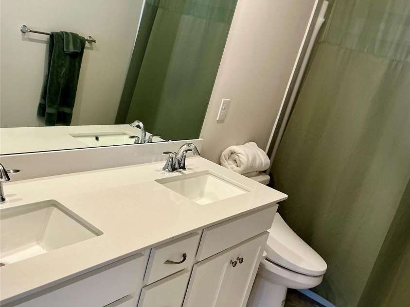 199 Hamptons Cove Road, Troutman, NC 28166.  MLS# CAR4398943, YatesRealty ID 35974. Shared hall bathroom w/double sinks