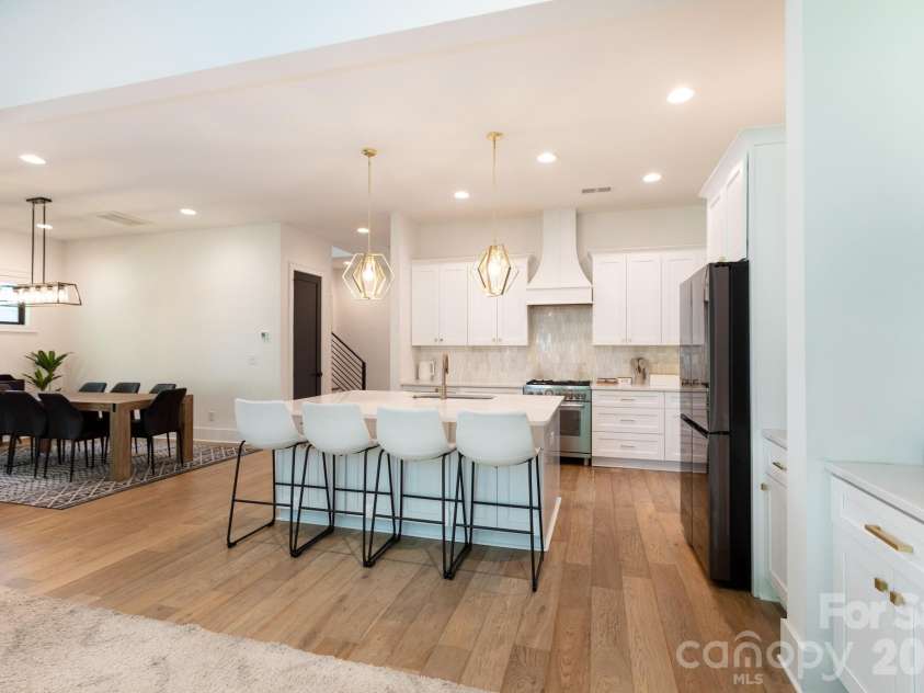 2629 Elon Street, Charlotte, NC 28208.  MLS# CAR4397259, YatesRealty ID 35978. Kitchen opens to dining area