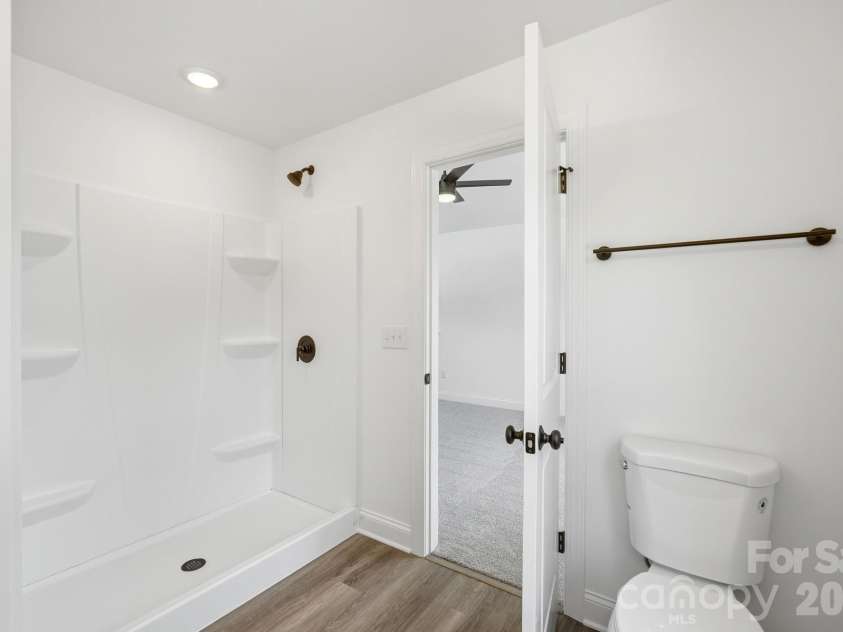 116 7th Avenue, Hickory, NC 28602.  MLS# CAR4400544, YatesRealty ID 35983. Large Shower in Primary Bedroom