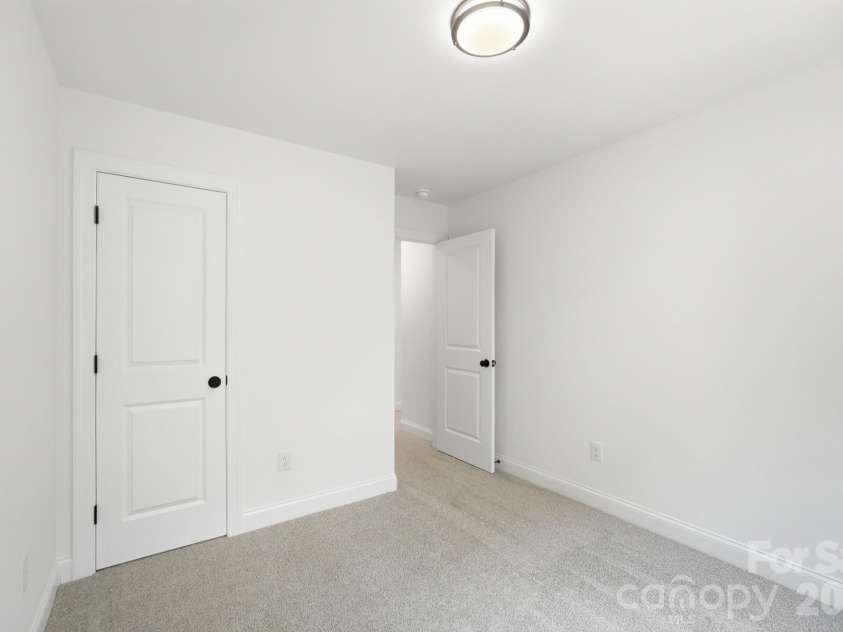 116 7th Avenue, Hickory, NC 28602.  MLS# CAR4400544, YatesRealty ID 35983. Third Upstairs Bedroom
