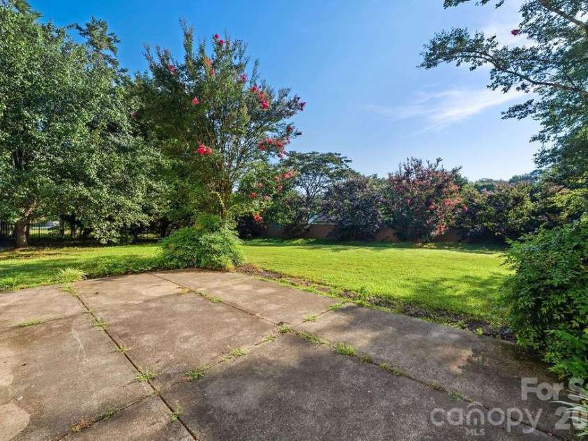 7424 Hannah Alexander Lane, Charlotte, NC 28227.  MLS# CAR4402040, YatesRealty ID 35986. Back Patio over looking yard