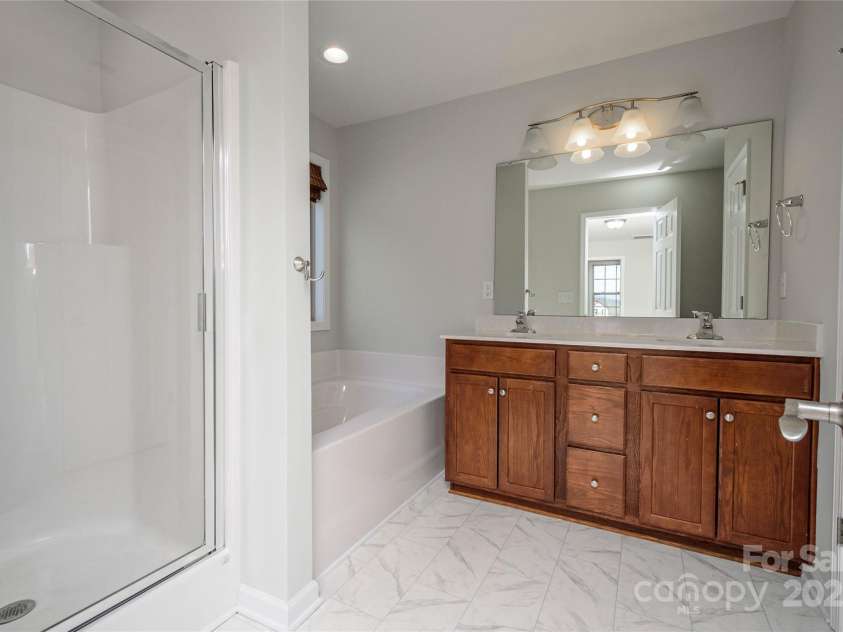 35 Greenly Lane, Fletcher, NC 28732.  MLS# CAR4333662, YatesRealty ID 3599. Primary Bath