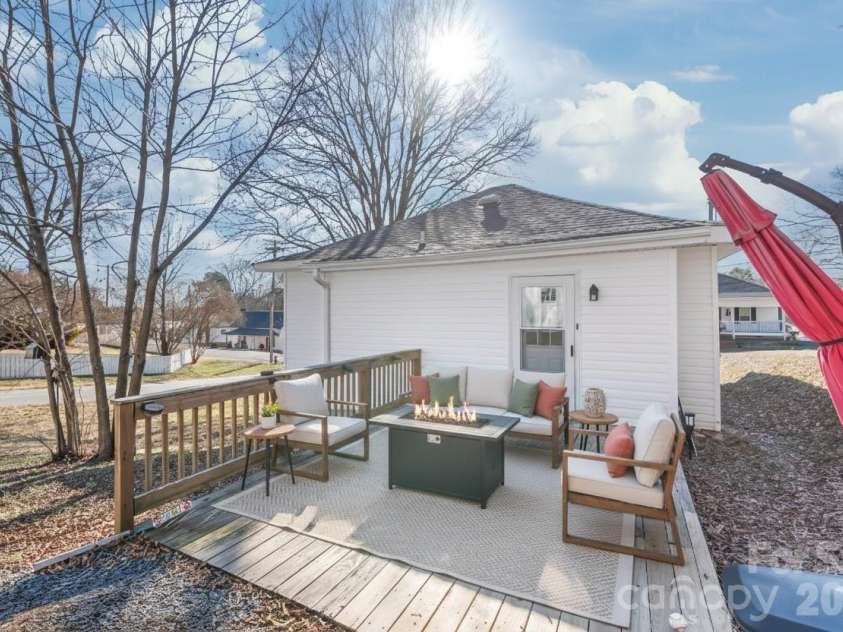 1206 Wiscassett Street, Albemarle, NC 28001.  MLS# CAR4338762, YatesRealty ID 3600. Oversized Deck - Virtually Staged