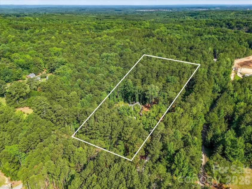 1215 Pine Forest Drive, Lancaster, SC 29720.  MLS# CAR4398929, YatesRealty ID 36013. Approximate outline of property. View is looking north towards Fort Mill