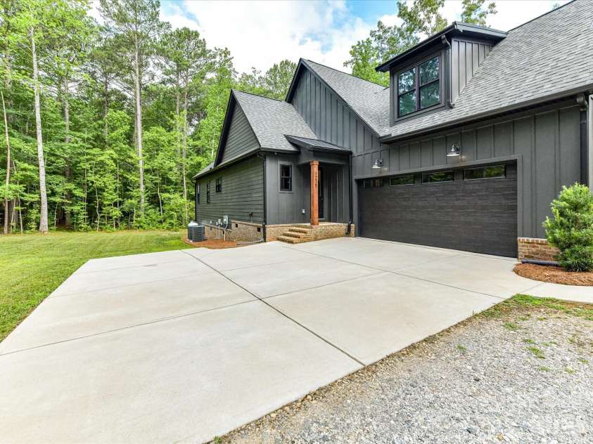 1215 Pine Forest Drive, Lancaster, SC 29720.  MLS# CAR4398929, YatesRealty ID 36013. Parking and 2 car garage