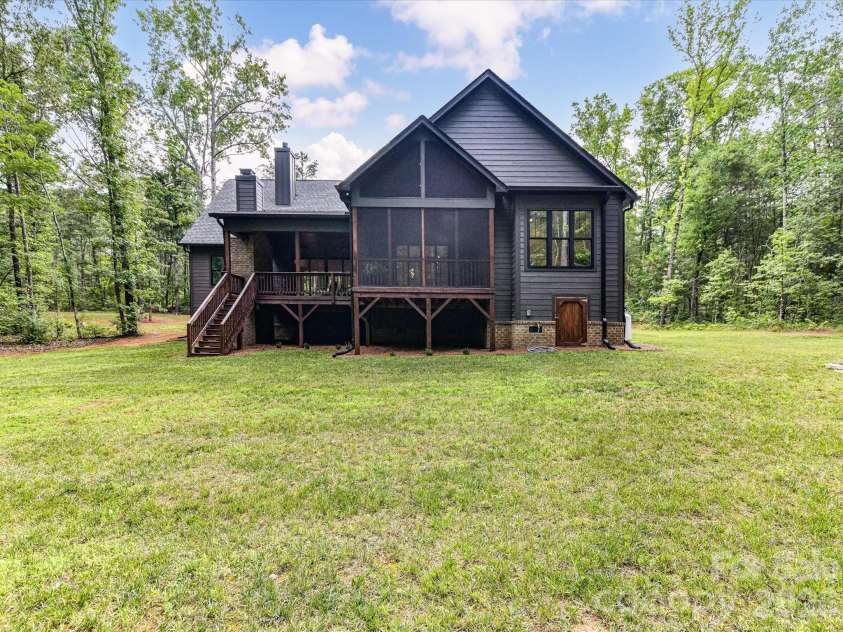 1215 Pine Forest Drive, Lancaster, SC 29720.  MLS# CAR4398929, YatesRealty ID 36013. View of covered deck and lanai