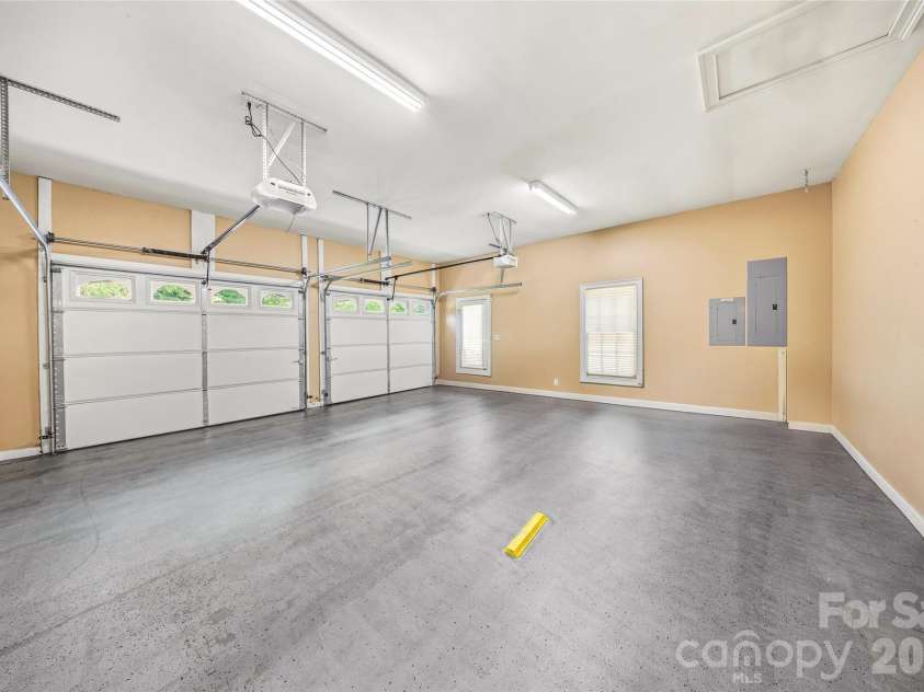 200 Teaberry Lane, Hendersonville, NC 28739.  MLS# CAR4399670, YatesRealty ID 36016. Main-Level Two-Car Garage