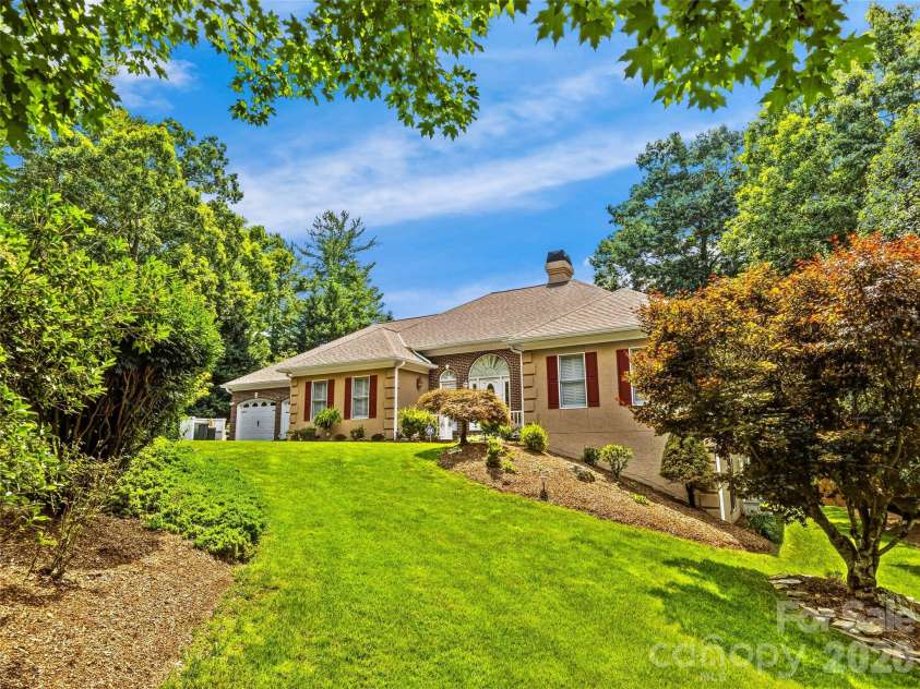 200 Teaberry Lane, Hendersonville, NC 28739.  MLS# CAR4399670, YatesRealty ID 36016. Private, Park-Like Setting