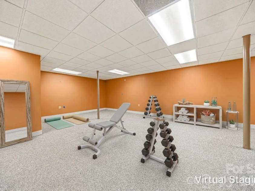 200 Teaberry Lane, Hendersonville, NC 28739.  MLS# CAR4399670, YatesRealty ID 36016. Virtually Staged Exercise Room