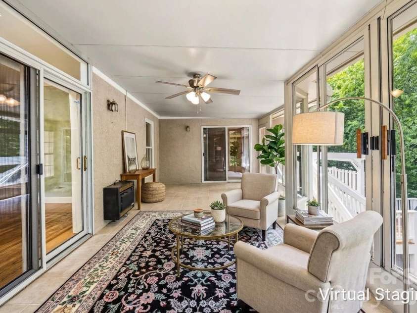 200 Teaberry Lane, Hendersonville, NC 28739.  MLS# CAR4399670, YatesRealty ID 36016. Virtually Staged Sunroom