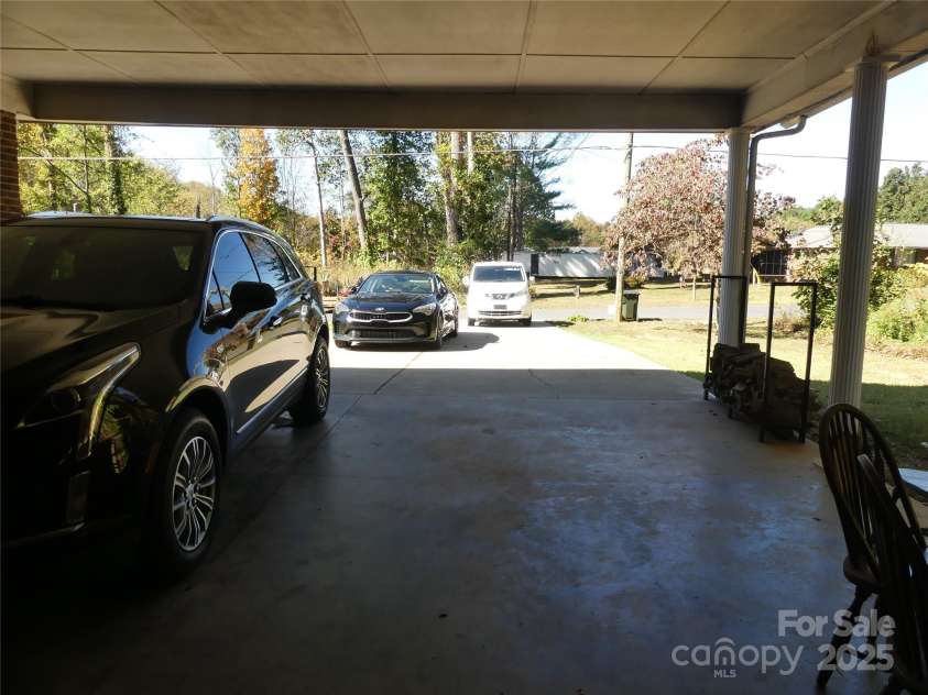 355 Swink Avenue, Salisbury, NC 28147.  MLS# CAR4314538, YatesRealty ID 3602. Huge carport and nice double driveway.