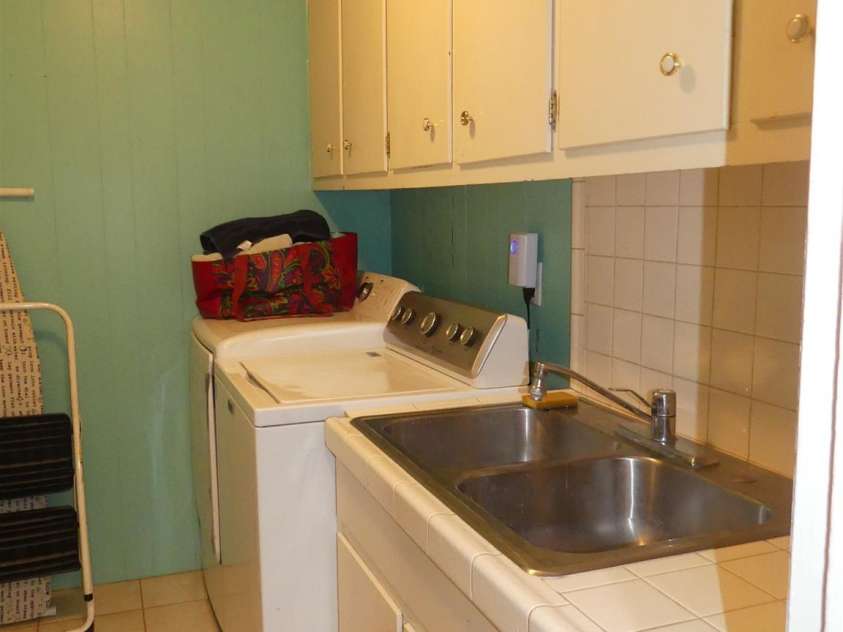 355 Swink Avenue, Salisbury, NC 28147.  MLS# CAR4314538, YatesRealty ID 3602. Storage in the laundry room!