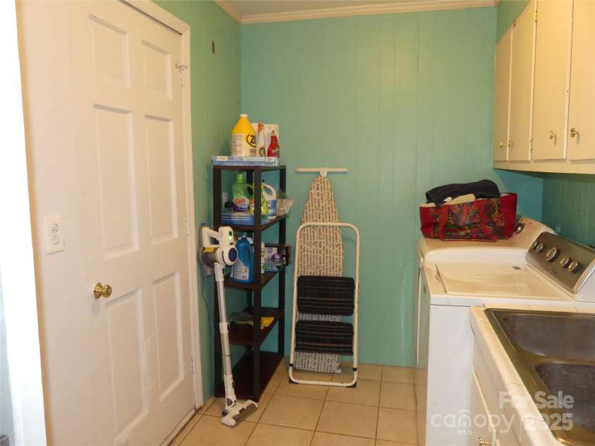 355 Swink Avenue, Salisbury, NC 28147.  MLS# CAR4314538, YatesRealty ID 3602. Washer and dryer stay.  Door leads to back patio.