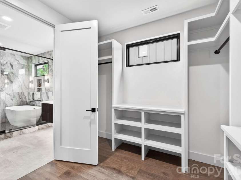 850 Belmont Avenue, Charlotte, NC 28205.  MLS# CAR4362751, YatesRealty ID 36021. Custom Built Primary Closet