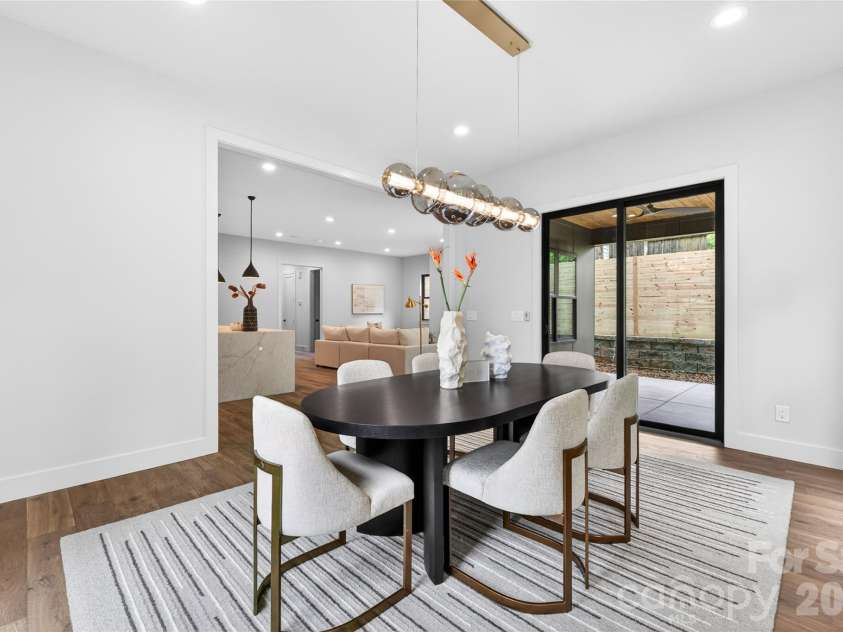 850 Belmont Avenue, Charlotte, NC 28205.  MLS# CAR4362751, YatesRealty ID 36021. Dedicated Dining Room opens up to covered back porch