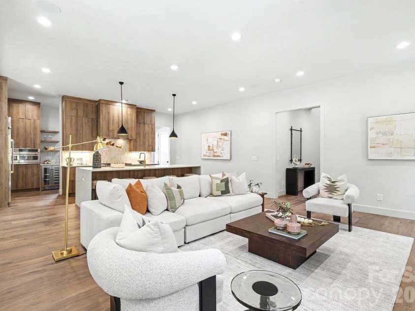 850 Belmont Avenue, Charlotte, NC 28205.  MLS# CAR4362751, YatesRealty ID 36021. Living Space open to Kitchen & Dining