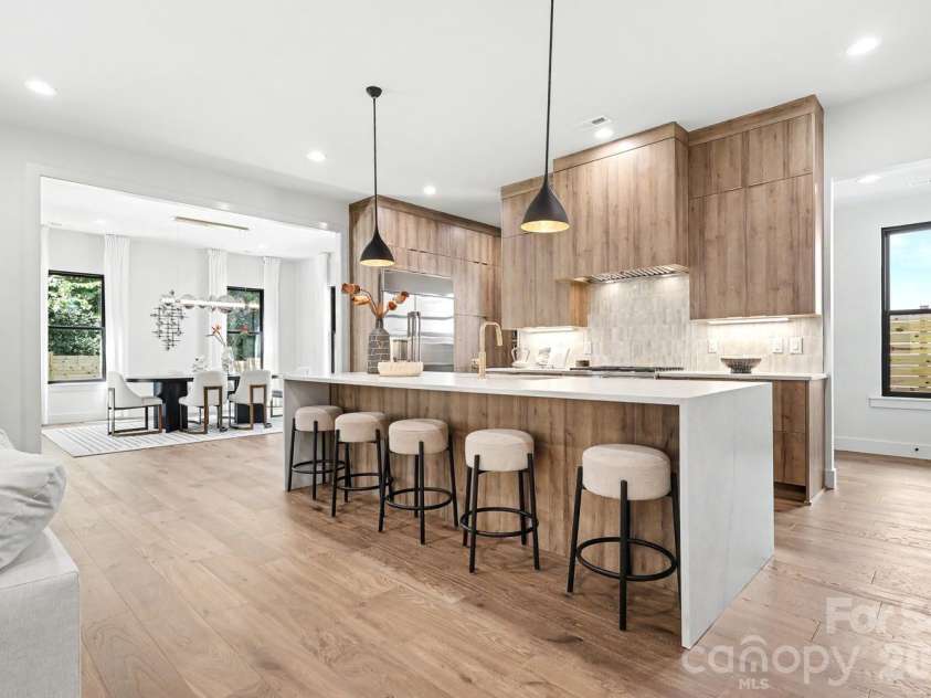 850 Belmont Avenue, Charlotte, NC 28205.  MLS# CAR4362751, YatesRealty ID 36021. Oversized waterfall kitchen island