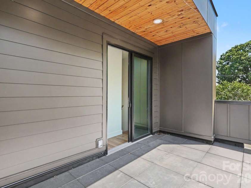 850 Belmont Avenue, Charlotte, NC 28205.  MLS# CAR4362751, YatesRealty ID 36021. Sliding Glass Doors to Rooftop