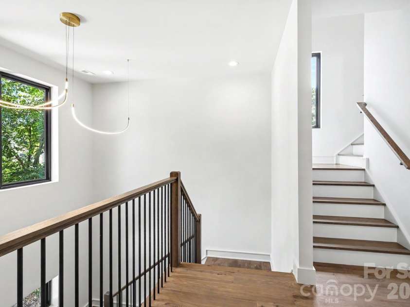 850 Belmont Avenue, Charlotte, NC 28205.  MLS# CAR4362751, YatesRealty ID 36021. Stairwell to third floor