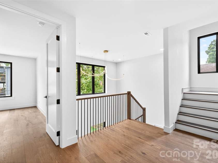 850 Belmont Avenue, Charlotte, NC 28205.  MLS# CAR4362751, YatesRealty ID 36021. Third Floor Stairway Entry