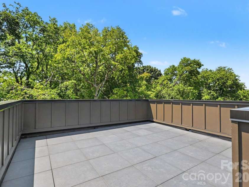850 Belmont Avenue, Charlotte, NC 28205.  MLS# CAR4362751, YatesRealty ID 36021. Vast finished terrace