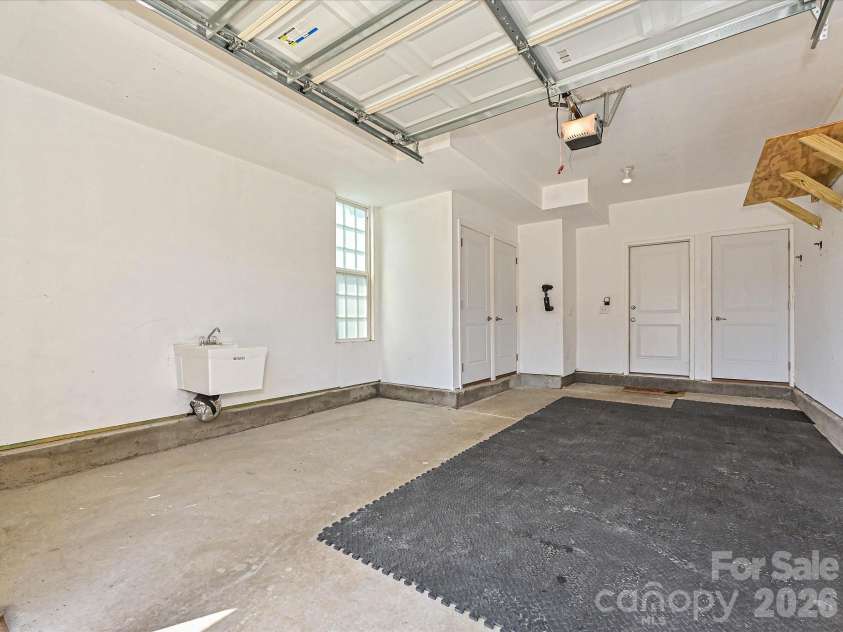 19791 Playwrights Way, Cornelius, NC 28031.  MLS# CAR4388972, YatesRealty ID 36024. Garage with Laundry Sink and extra Storage