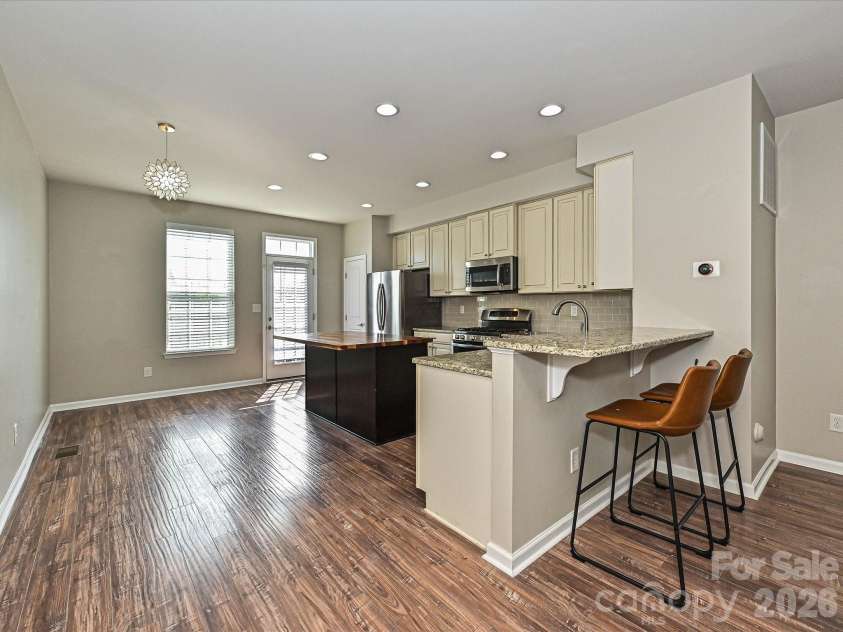 19791 Playwrights Way, Cornelius, NC 28031.  MLS# CAR4388972, YatesRealty ID 36024. Kitchen and Dining