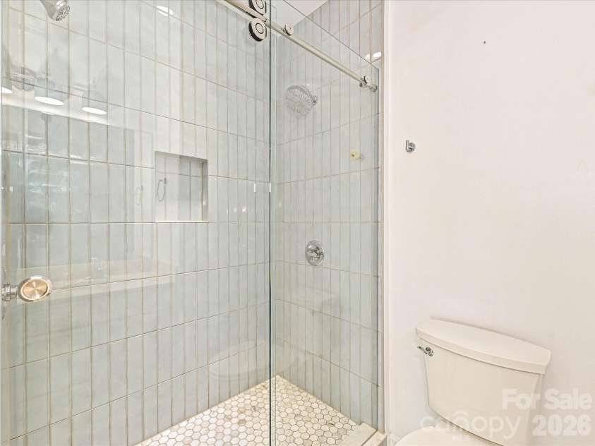 19791 Playwrights Way, Cornelius, NC 28031.  MLS# CAR4388972, YatesRealty ID 36024. Primary Bathroom with Frameless Shower and Custom Tile