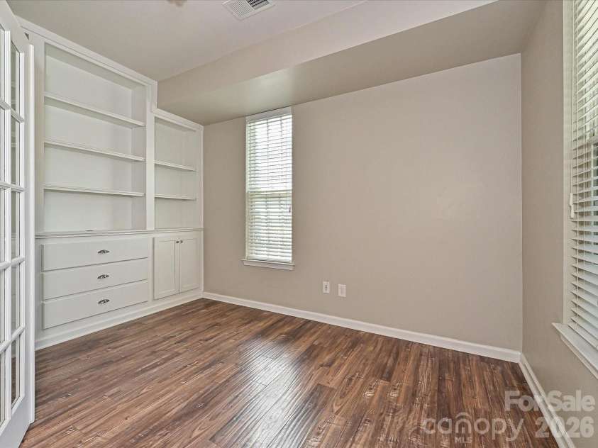 19791 Playwrights Way, Cornelius, NC 28031.  MLS# CAR4388972, YatesRealty ID 36024. Study with Built in Cabinets