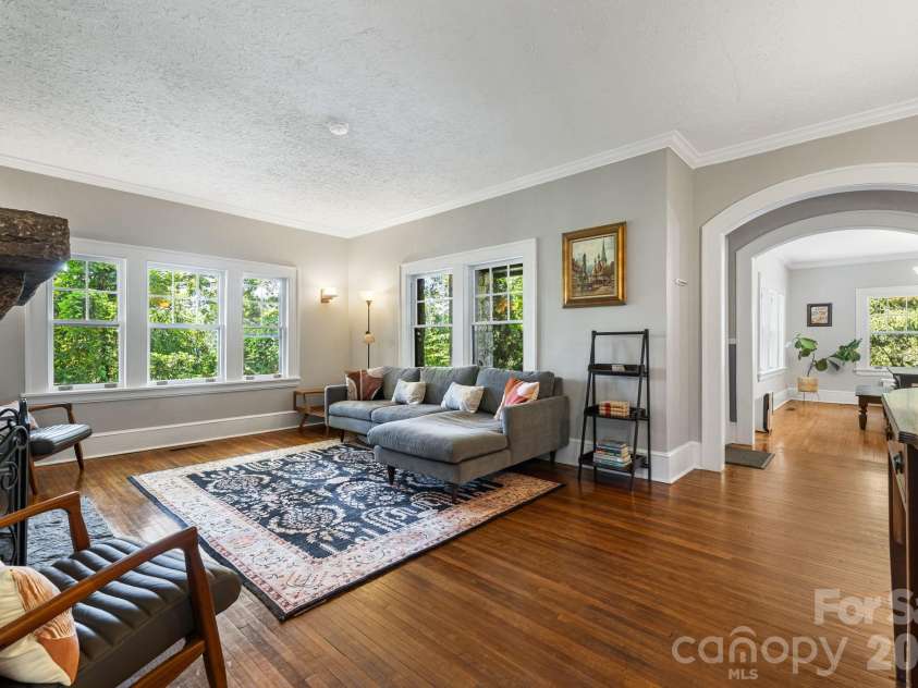 25 Saint Dunstans Circle, Asheville, NC 28803.  MLS# CAR4400820, YatesRealty ID 36032. Large living room space