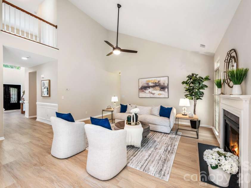20307 Southshore Drive, Cornelius, NC 28031.  MLS# CAR4395285, YatesRealty ID 36036. Family room with vaulted ceiling