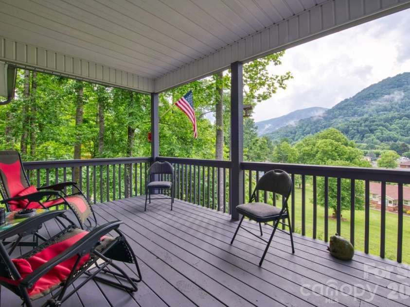 7 Higel Lane, Maggie Valley, NC 28751.  MLS# CAR4400794, YatesRealty ID 36040. Beautiful Mountain View from front cover deck