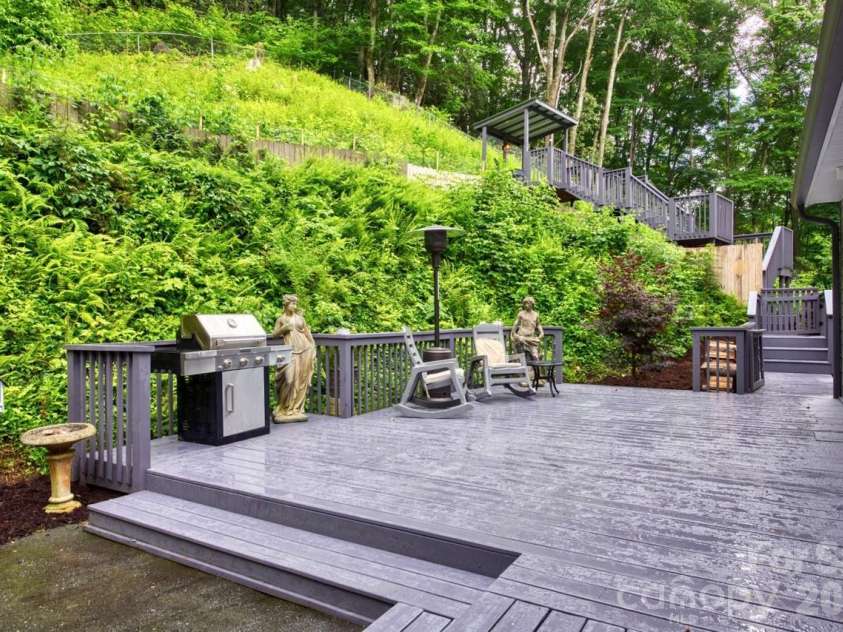 7 Higel Lane, Maggie Valley, NC 28751.  MLS# CAR4400794, YatesRealty ID 36040. Rear deck and patio