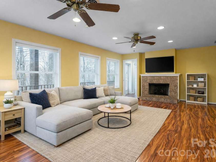 31 Timber Park Drive, Black Mountain, NC 28711.  MLS# CAR4336754, YatesRealty ID 3605. Basement family room virtually staged